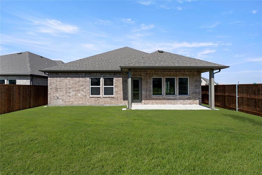 Exterior details and patio area of a home in Creekside, Royse City (Image 4).