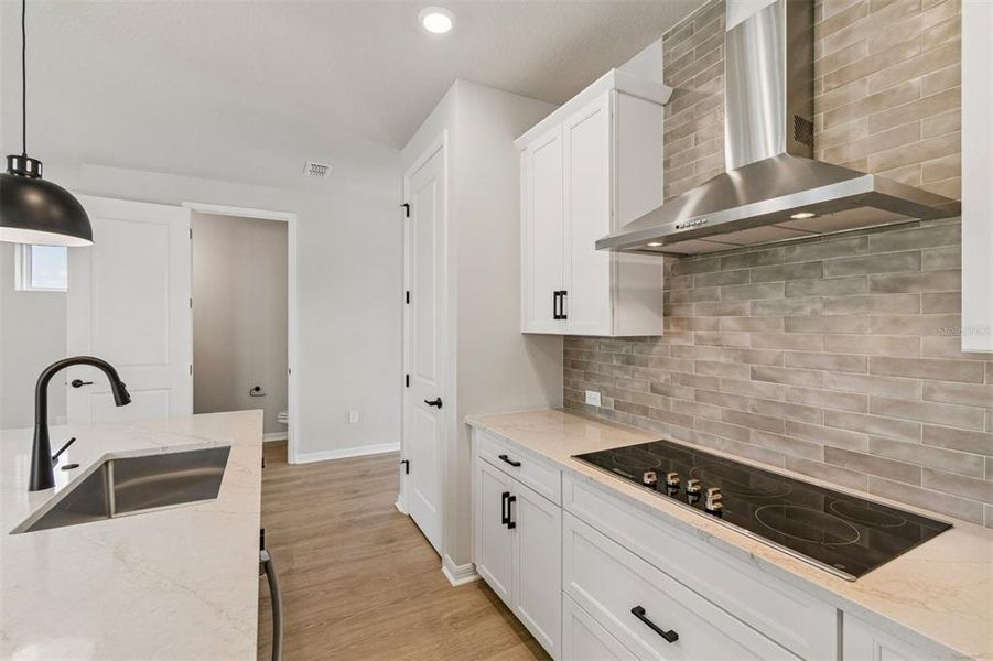 Furnished interior view inside a new home in Weslyn Park in Sunbridge 34', St. Cloud (Image 6).