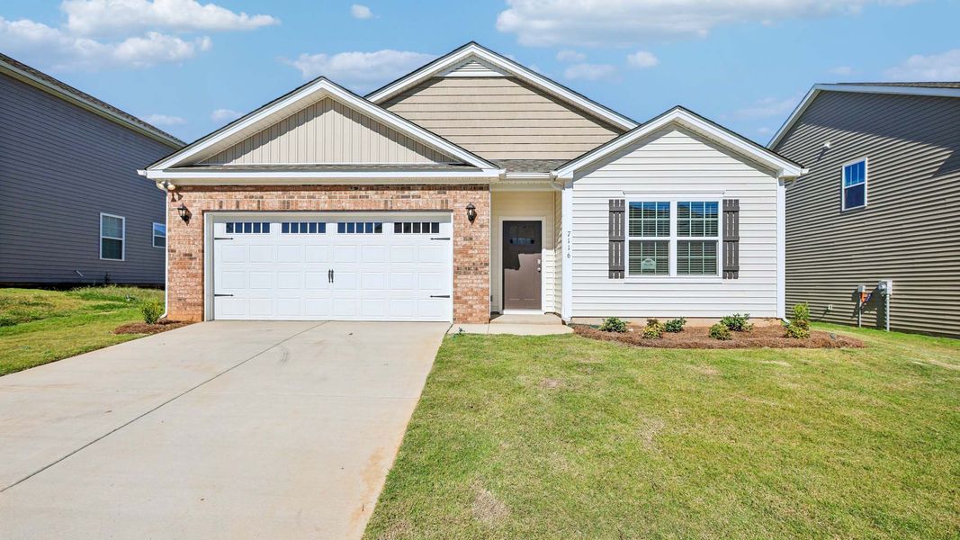 Front exterior of a new home in Cline Village, Conover, NC, highlighting curb appeal (Image 1). Front exterior of a new home in Cline Village, Conover, NC, highlighting curb appeal (Image 1).