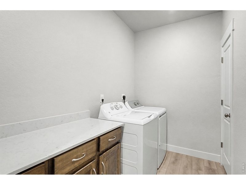 Furnished interior view inside a new home in Highlands at Fox Hill - The Flats, Longmont (Image 3).