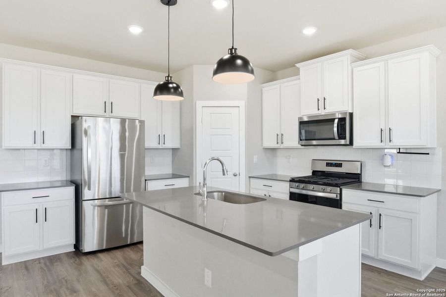 Furnished interior view inside a new home in Morgan Meadows, San Antonio (Image 13).