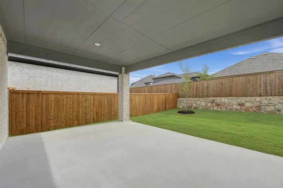 Exterior details and patio area of a home in South Oak, Lakewood Village (Image 3).