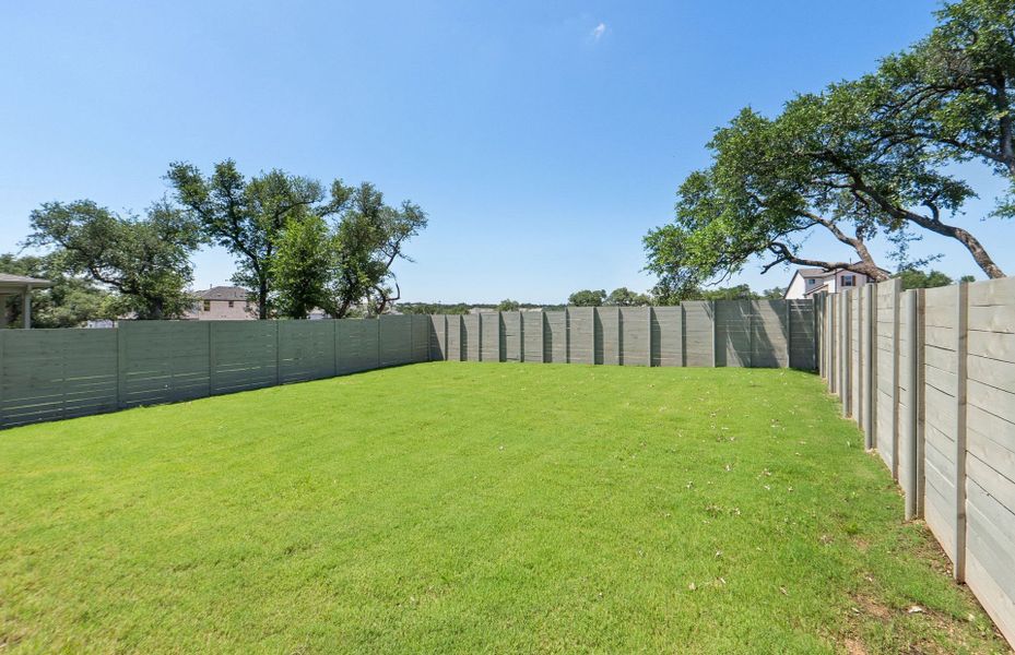 Exterior details and patio area of a home in Wolf Ranch, Georgetown (Image 27).