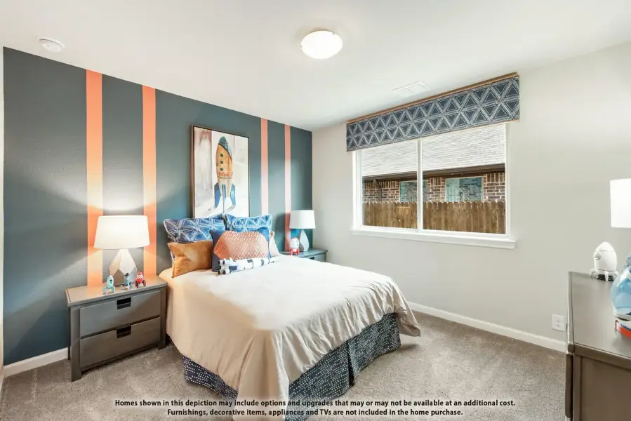 Children's bedroom with blue and orange striped accent wall, full bed, and carpet flooring