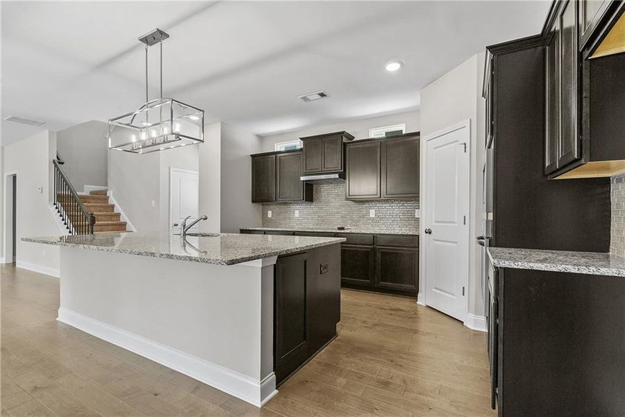 Furnished interior view inside a new home in Edenglen, Buford (Image 7).