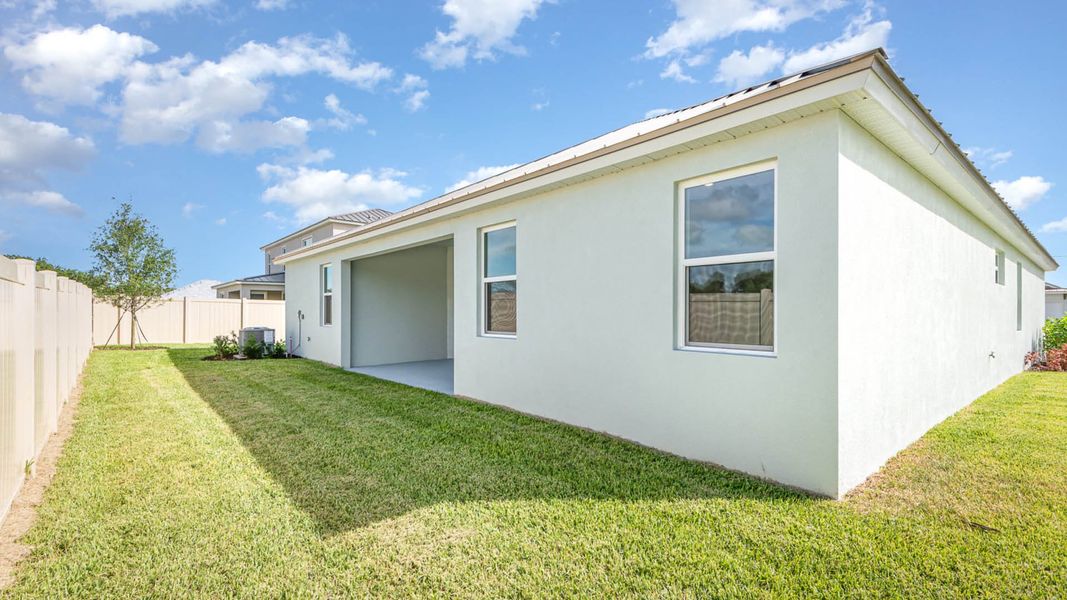 Exterior details and patio area of a home in Riverwalk of Cocoa, Cocoa (Image 3).