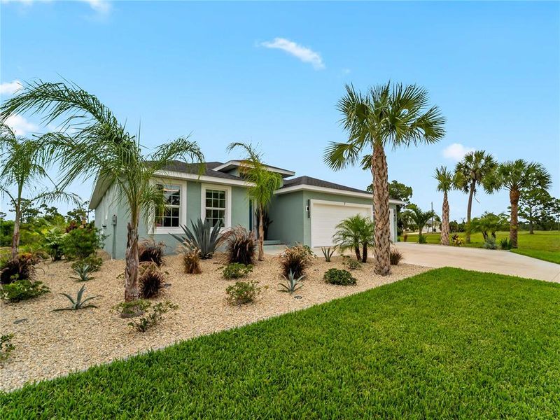 Front exterior of a new home in , Placida, FL, highlighting curb appeal (Image 22).