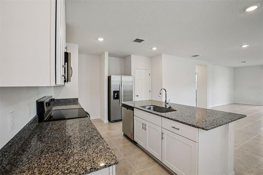 Furnished interior view inside a new home in Villamar - Classic Series, Winter Haven (Image 15).