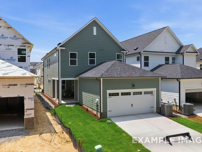 Front exterior of a new home in Forestville Yard, Knightdale, NC, highlighting curb appeal (Image 23). Front exterior of a new home in Forestville Yard, Knightdale, NC, highlighting curb appeal (Image 23).