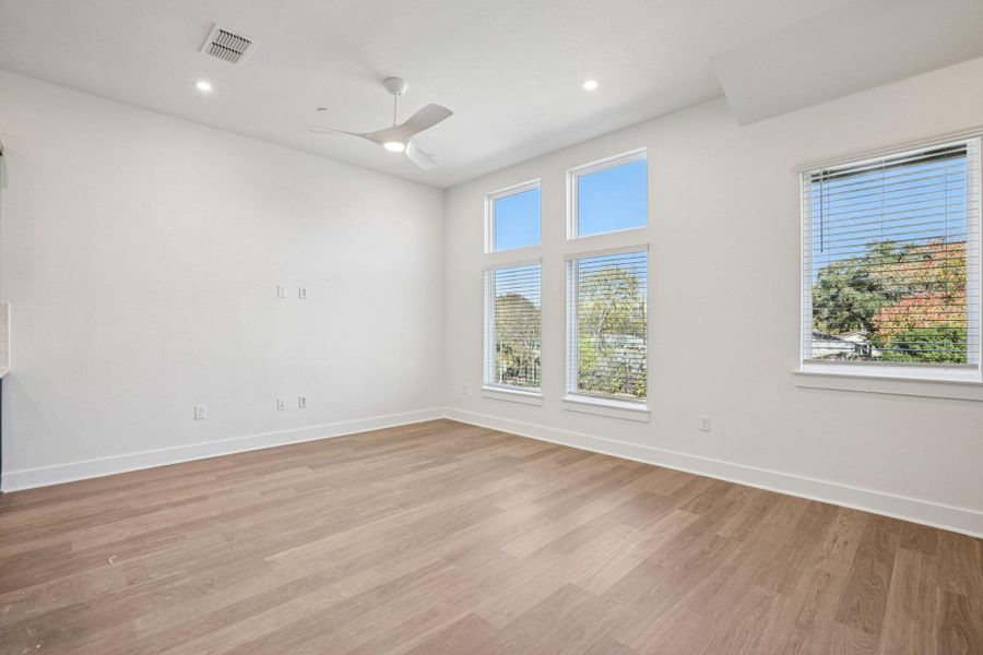 Spacious, unfurnished interior of a new home in Koenig Townhomes, Austin (Image 22).