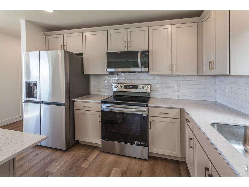 Furnished interior view inside a new home in Prairie Song Story Collection - Single Family Homes, Windsor (Image 5).