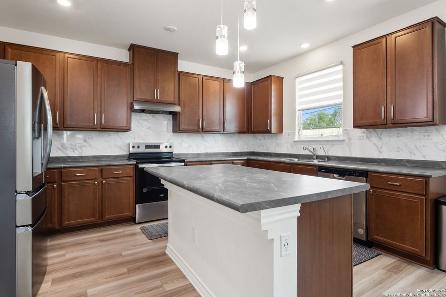 Furnished interior view inside a new home in Cove at Westover Hills, San Antonio (Image 7).