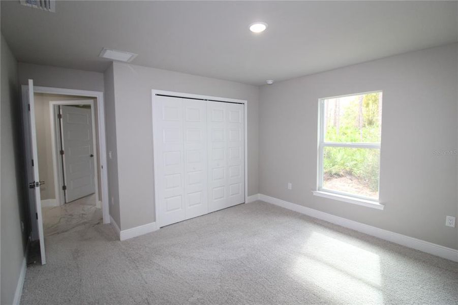 Spacious, unfurnished interior of a new home in , Port Charlotte (Image 25).
