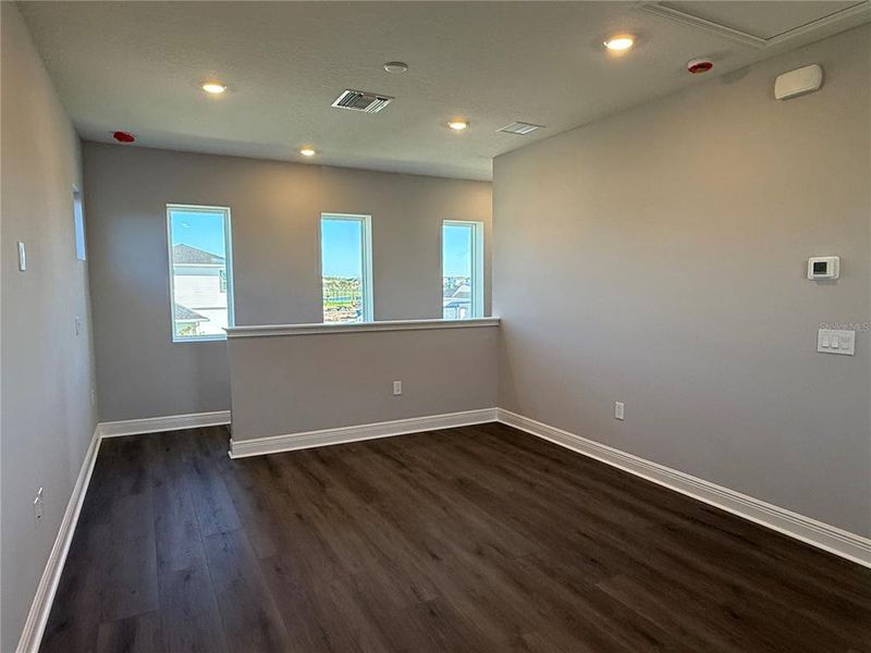 Spacious, unfurnished interior of a new home in Laureate Park, Orlando (Image 15).