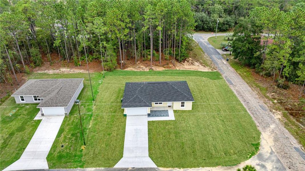 Front exterior of a new home in , Citrus Springs, FL, highlighting curb appeal (Image 20). Front exterior of a new home in , Citrus Springs, FL, highlighting curb appeal (Image 20).