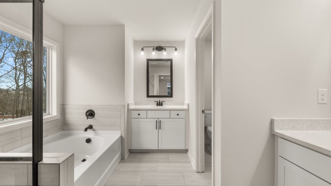 Representative furnished interior of a home built from the Bellview by D.R. Horton in Thalley Creek Estates, Cumming (Image 11).