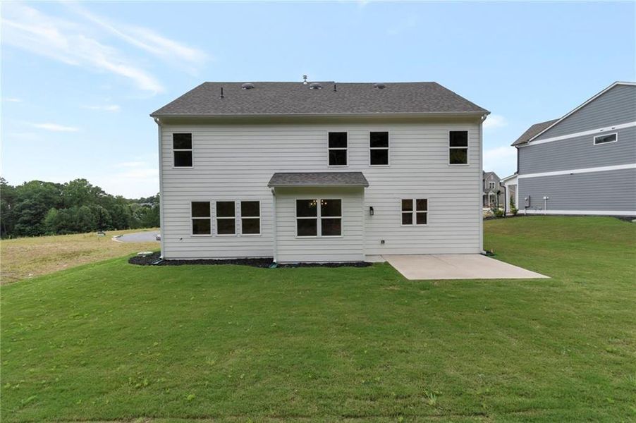 Front exterior of a new home in , Canton, GA, highlighting curb appeal (Image 14).