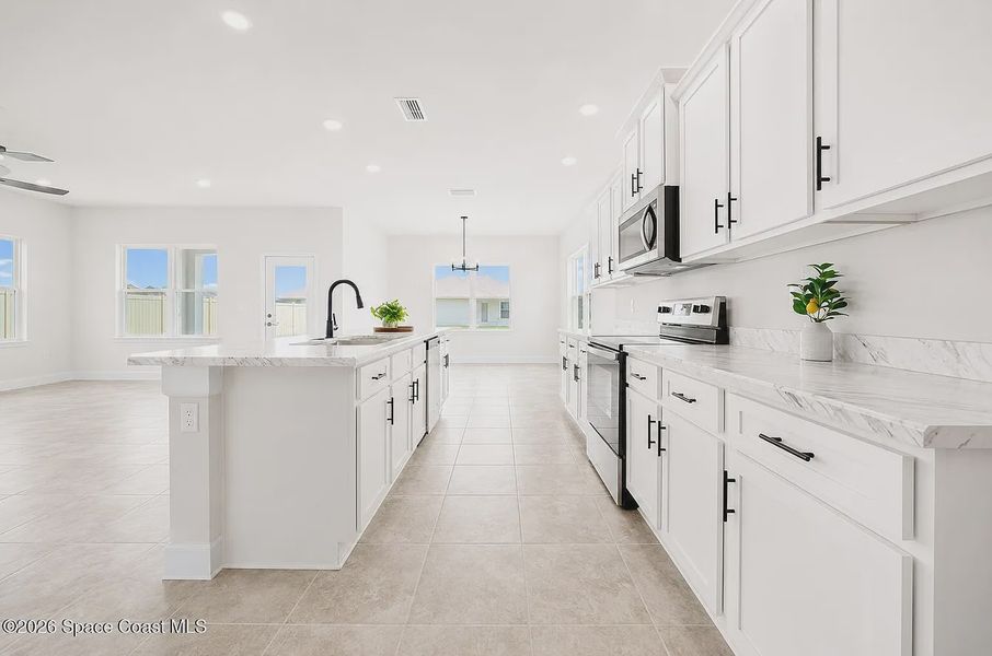Furnished interior view inside a new home in St. John's Preserve, Palm Bay (Image 5).