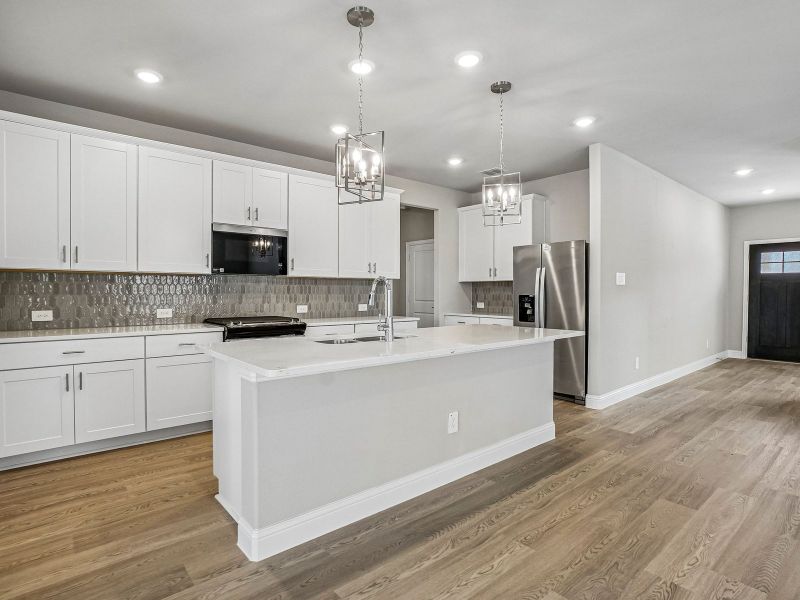 Furnished interior view inside a new home in Eastridge - Signature Series, McKinney (Image 5).
