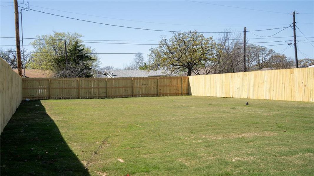 Exterior details and patio area of a home in , Denison (Image 3).