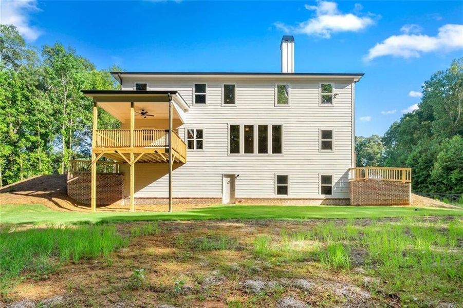 Exterior details and patio area of a home in Steeplechase, Hoschton (Image 24).