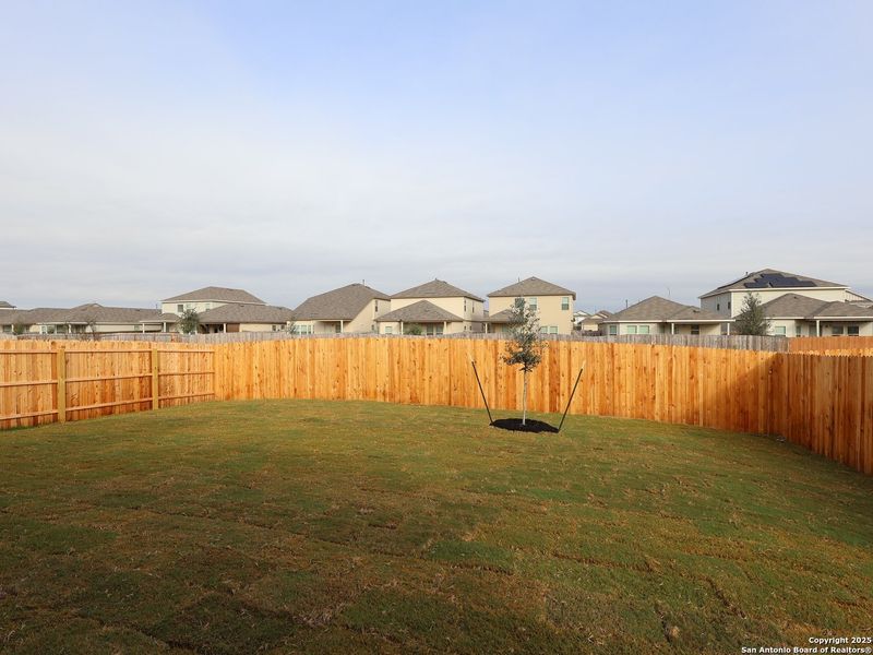 Exterior details and patio area of a home in Winding Brook, San Antonio (Image 23).
