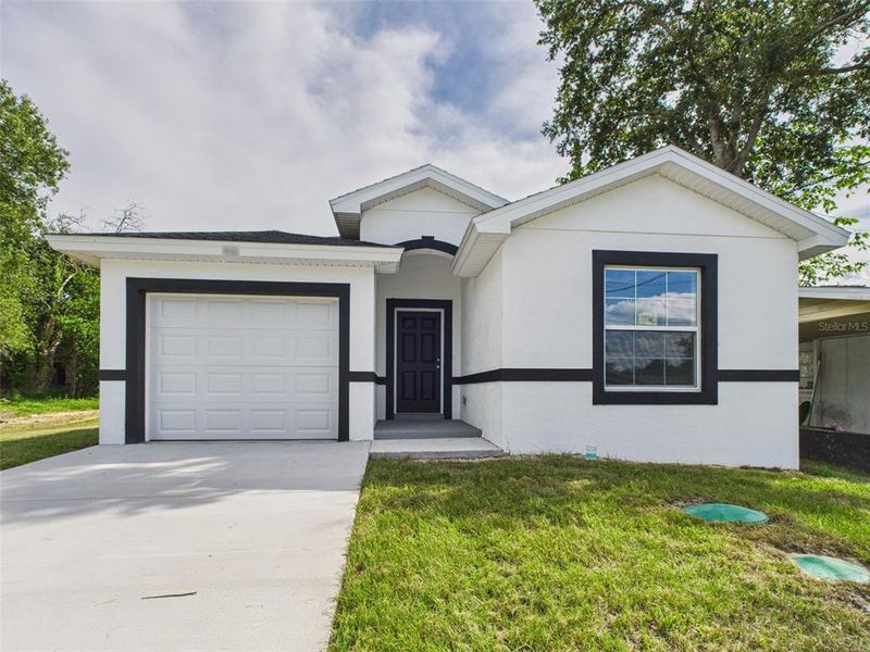 Front exterior of a new home in , Lakeland, FL, highlighting curb appeal (Image 28).