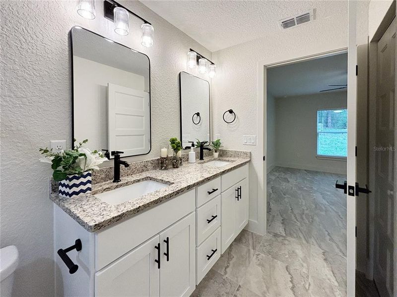 Furnished interior view inside a new home in , Dunnellon (Image 39).