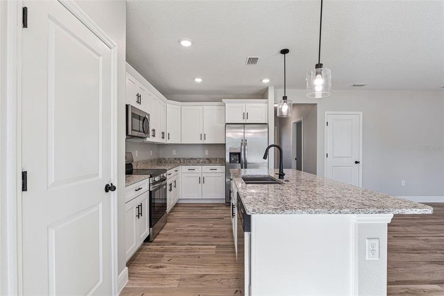 Furnished interior view inside a new home in , Deland (Image 4). Furnished interior view inside a new home in , Deland (Image 4).