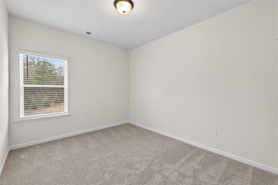 Spacious, unfurnished interior of a new home in Fuller Station, Loganville (Image 20).