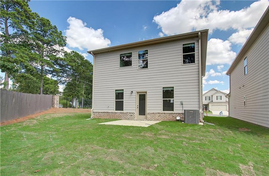 Exterior details and patio area of a home in Towne Center, Hampton (Image 4).