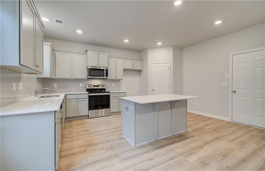 Furnished interior view inside a new home in Cedar Grove Commons, Conley (Image 3).