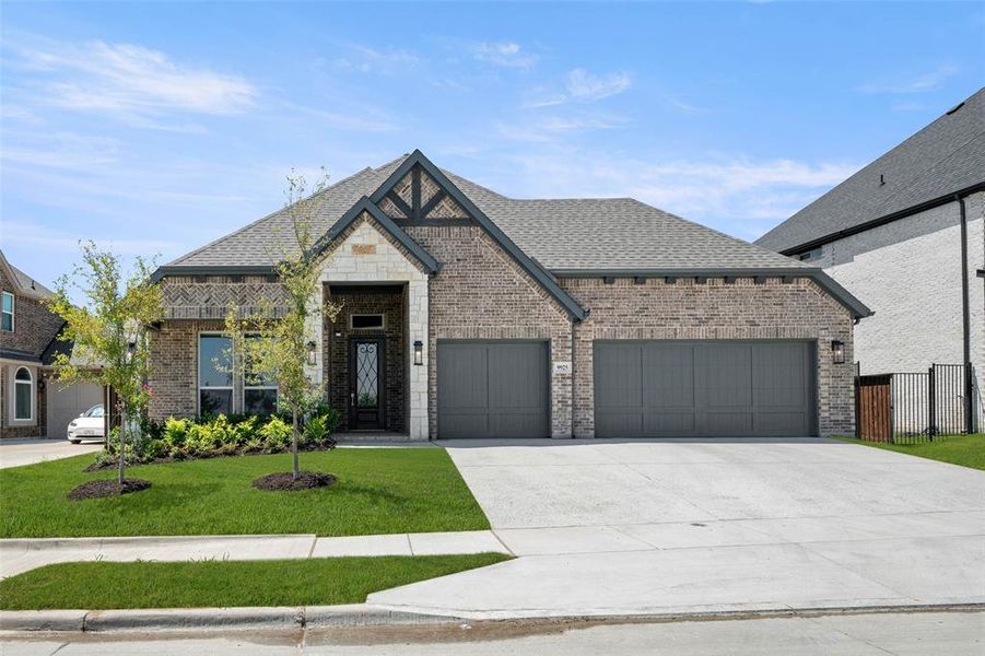 Front exterior of a new home in La Frontera, Fort Worth, TX, highlighting curb appeal (Image 23).