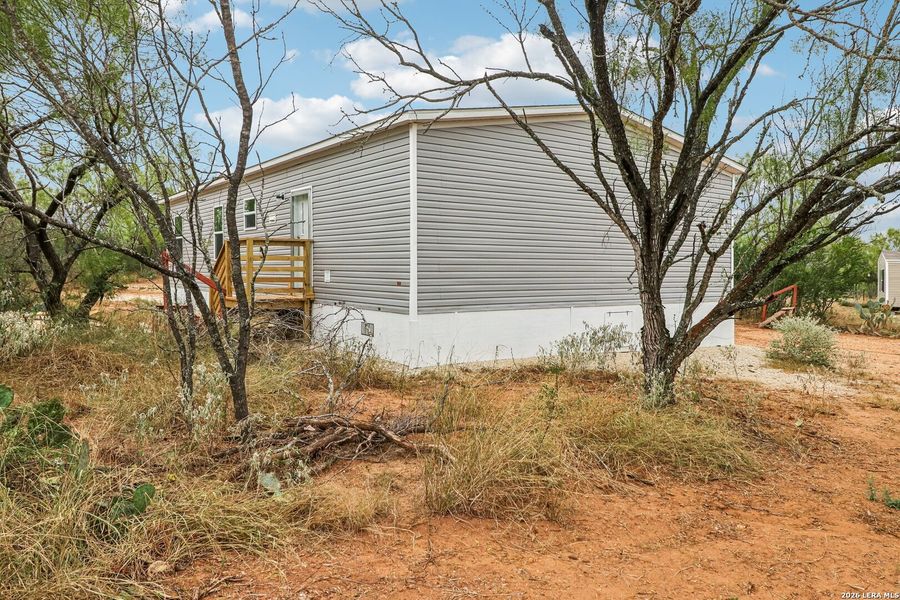 Exterior details and patio area of a home in , Devine (Image 21). Exterior details and patio area of a home in , Devine (Image 21).