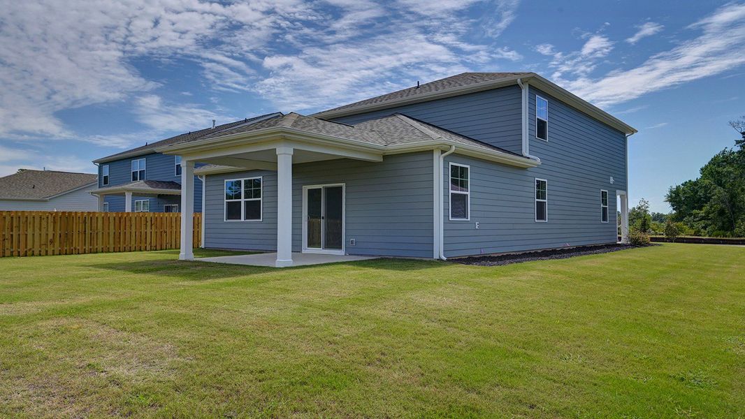 Front exterior of a new home in Sease's Pond, Gilbert, SC, highlighting curb appeal (Image 19). Front exterior of a new home in Sease's Pond, Gilbert, SC, highlighting curb appeal (Image 19).