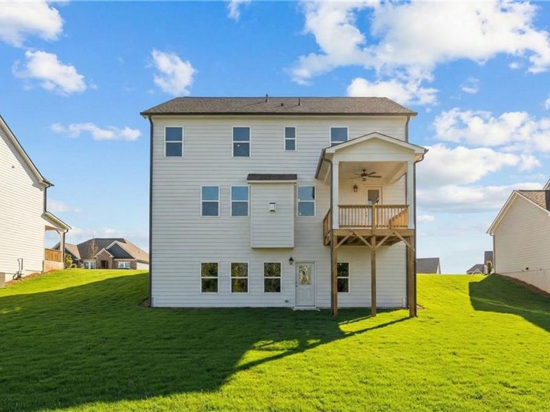 Exterior details and patio area of a home in Wehunt Meadows, Hoschton (Image 4).