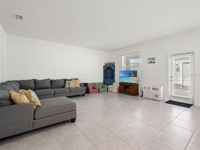 Furnished interior view inside a new home in Wellness Ridge, Clermont (Image 12).