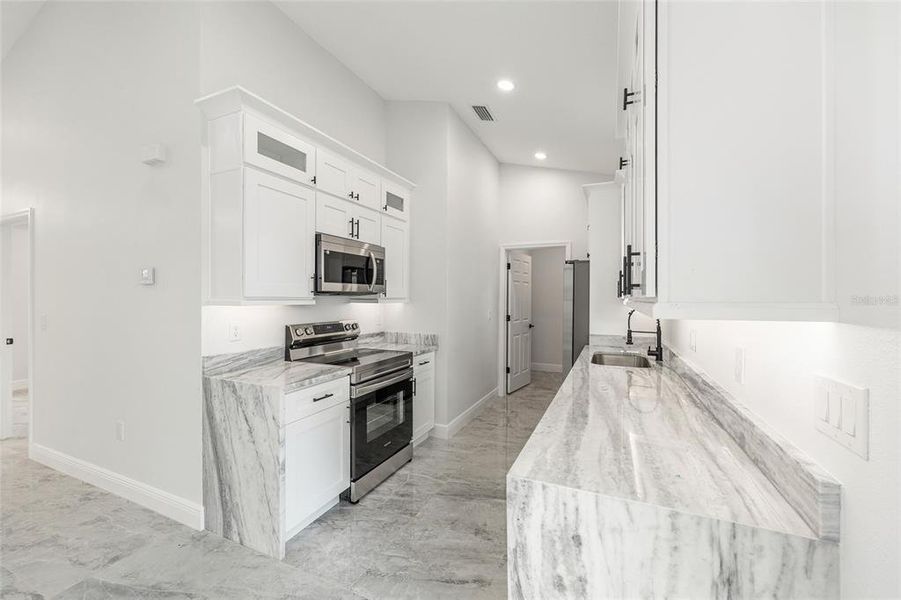 Furnished interior view inside a new home in , Summerfield (Image 9).