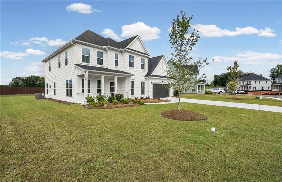 Front exterior of a new home in Creekside at Skelton, Jefferson, GA, highlighting curb appeal (Image 26).