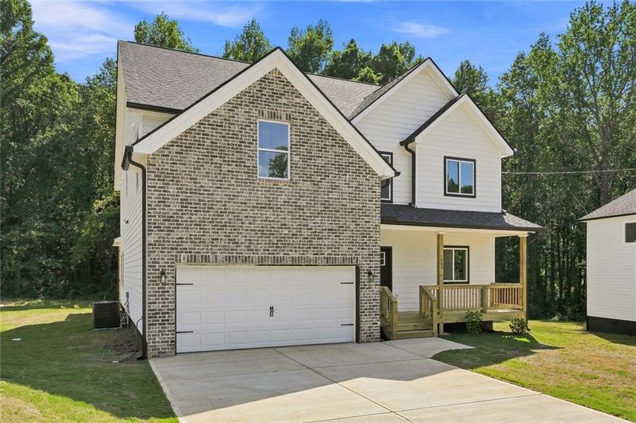 Front exterior of a new home in , Austell, GA, highlighting curb appeal (Image 2). Front exterior of a new home in , Austell, GA, highlighting curb appeal (Image 2).