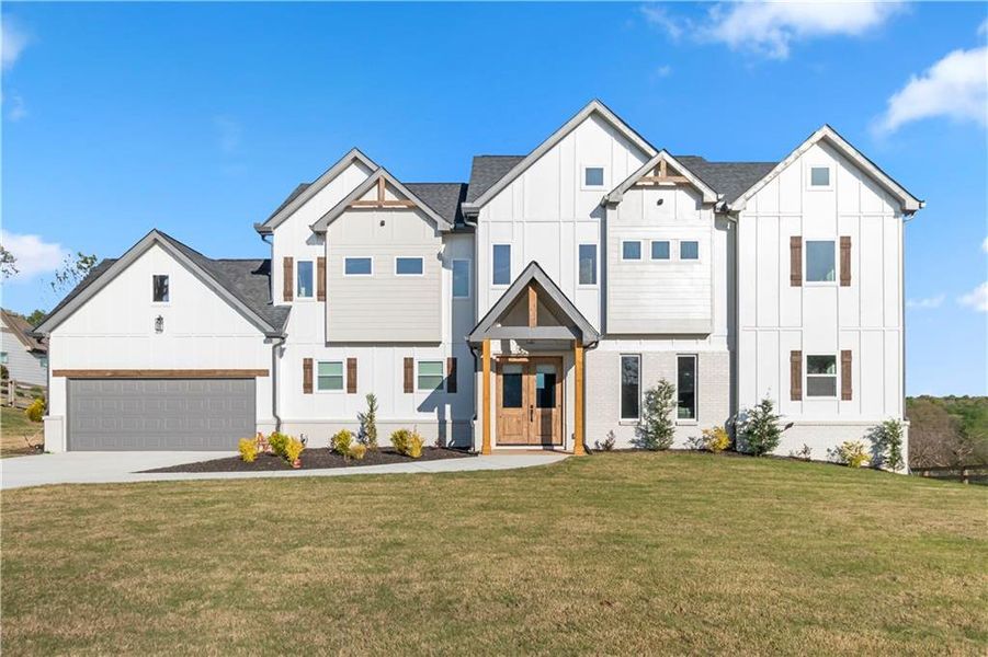 Front exterior of a new home in , Clermont, GA, highlighting curb appeal (Image 1). Front exterior of a new home in , Clermont, GA, highlighting curb appeal (Image 1).