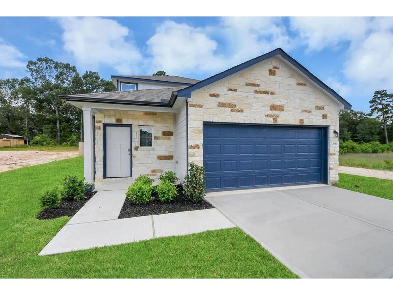 Front exterior of a new home in Liberty Estates, Cleveland, TX, highlighting curb appeal (Image 1). Front exterior of a new home in Liberty Estates, Cleveland, TX, highlighting curb appeal (Image 1).