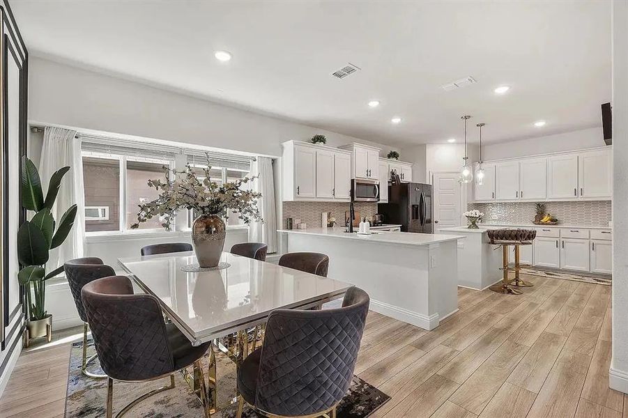 Dining room featuring light hardwood / wood-style flooring