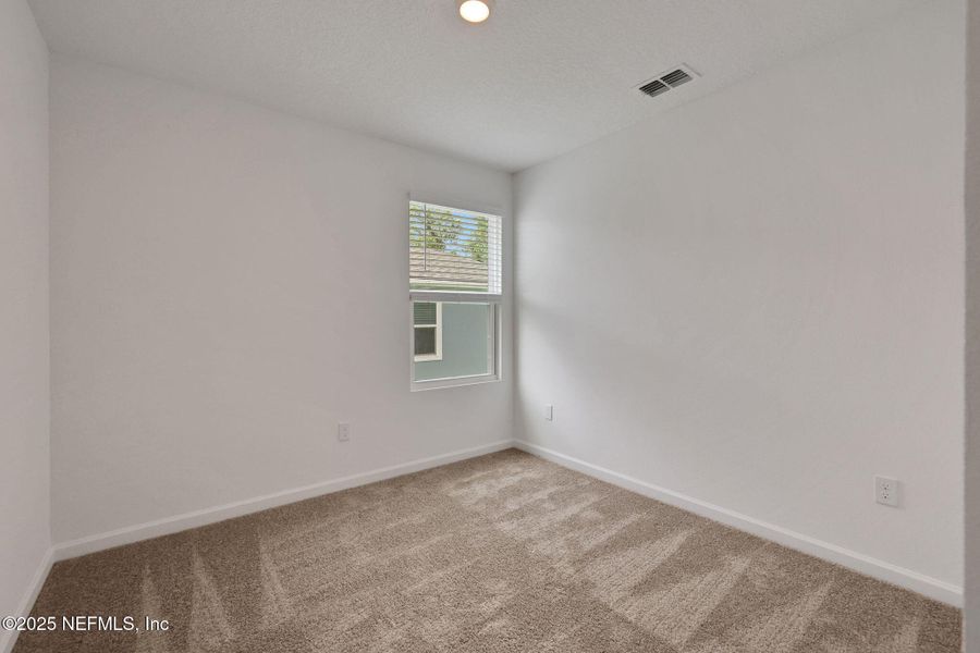 Spacious, unfurnished interior of a new home in Kasen Oaks, Jacksonville (Image 12).