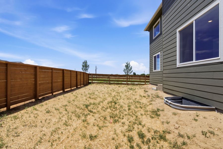 Exterior details and patio area of a home in Cordovan, Firestone (Image 3).
