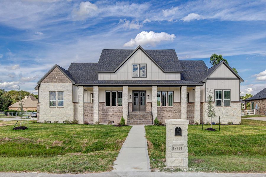 Front exterior of a new home in , Cypress, TX, highlighting curb appeal (Image 26).