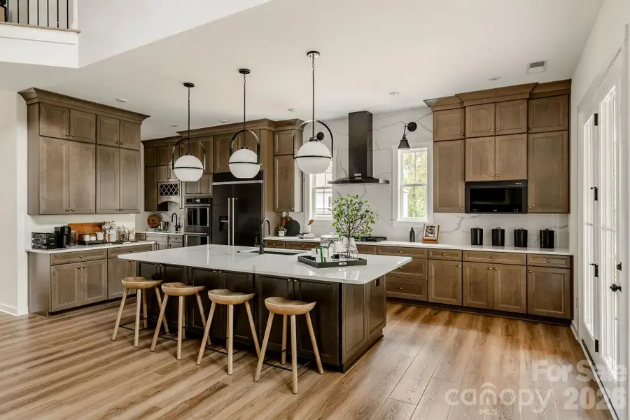 Photos are of a similar model showing added cost options