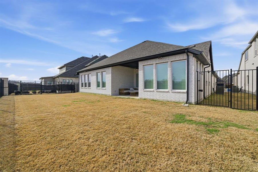 Exterior details and patio area of a home in Gideon Grove, Rockwall (Image 27).