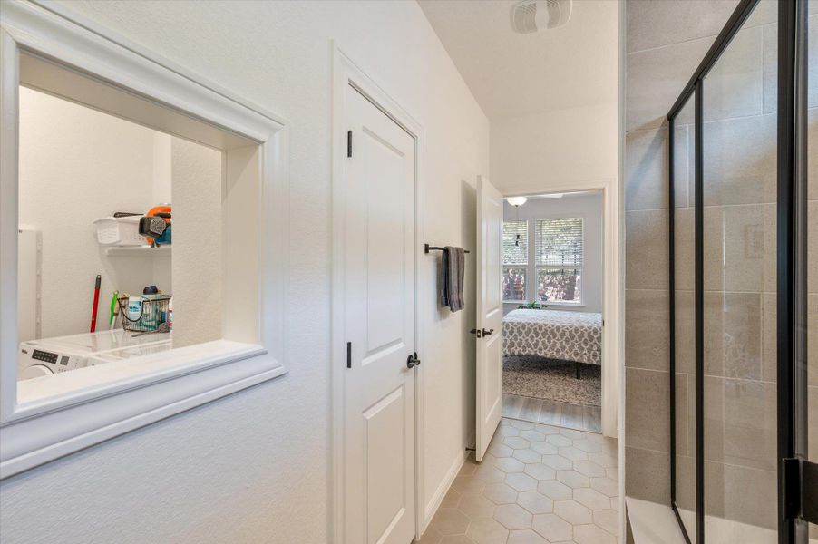 Primary Bath featuring a laundry chute Primary Bath featuring a laundry chute