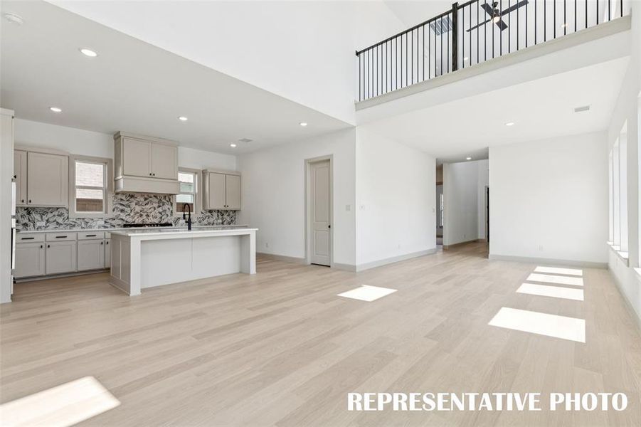 With a game room that overlooks the family room, our Adeline plan offers multiple entertainment zones.  REPRESENTATIVE PHOTO